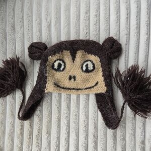 Peruvian Trading Co. Happy Oragutan Wooly PomPom Hat